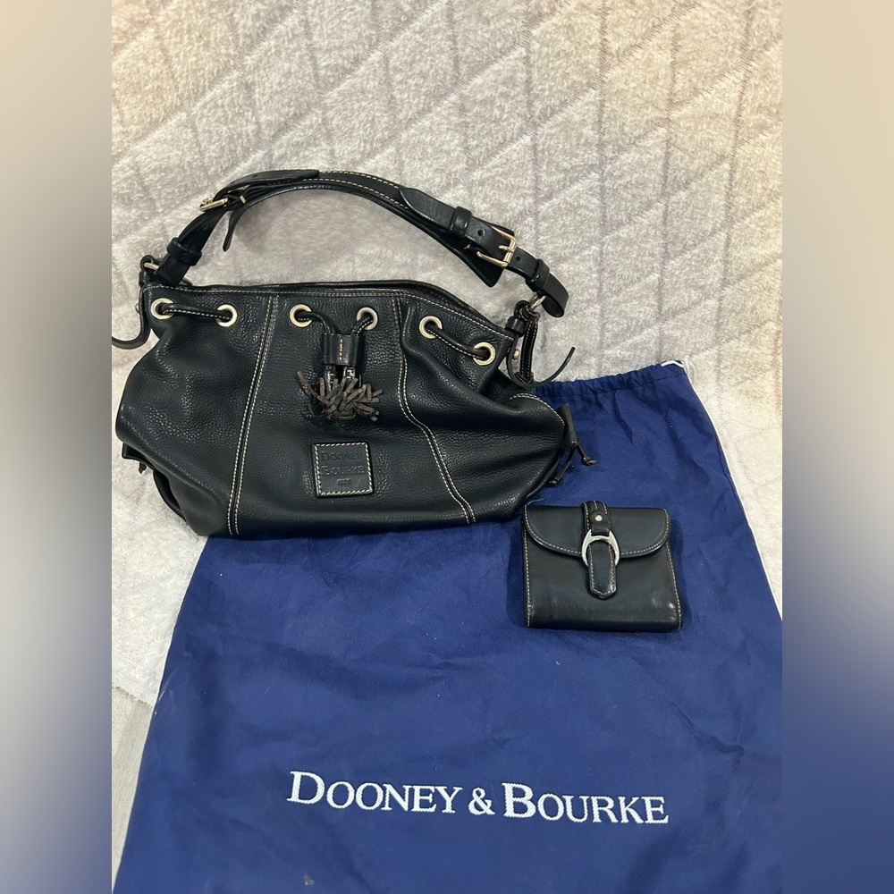 Dooney and Bourke Black leather handbag and wallet.